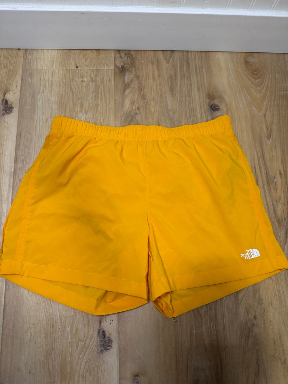 The North Face men’s Bright Yellow Athletic Shorts size medium